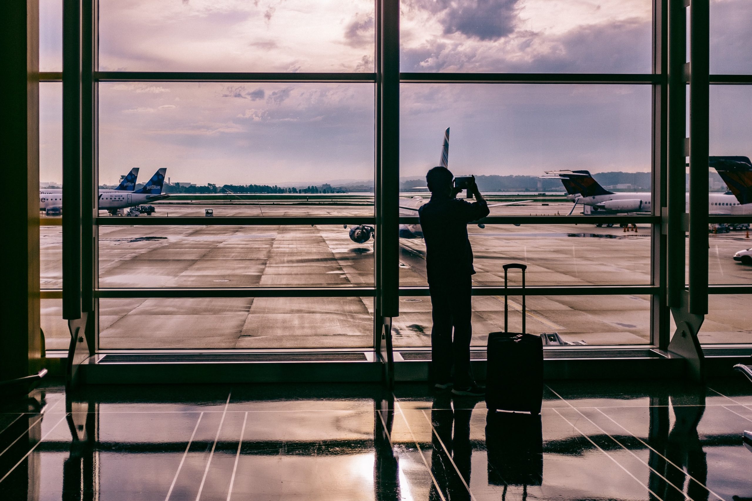 Person taking photos in airport