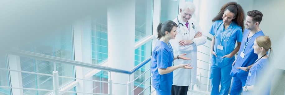 Doctors conversing in a hospital