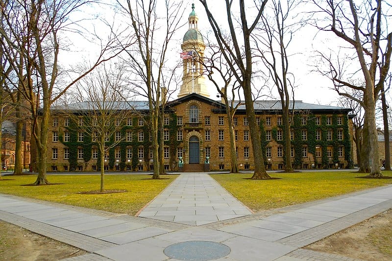 Nassau Hall, a multistorey brick and stone building on Princeton's campus, stands at one of the end points of a star-shaped convergence of paths.