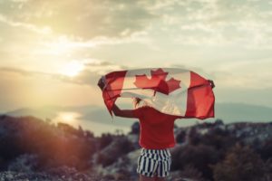 Person holding Canada flag