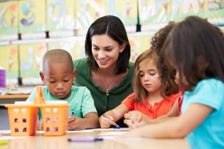 Preschool teacher with students