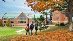 Students walking on Algoma University campus in fall