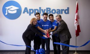 ApplyBoard's CMO, CEO, and COO cutting a blue ribbon with Ward 10 Councillor for Kitchener Sarah Marsh and University of Waterloo President Feridun Hamdullahpur.