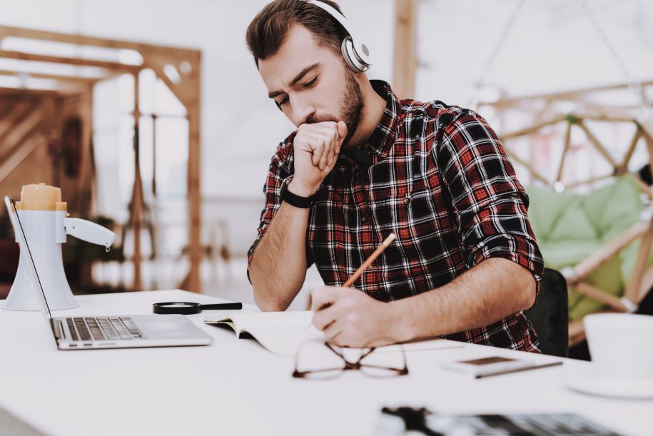 Man listening to music while working