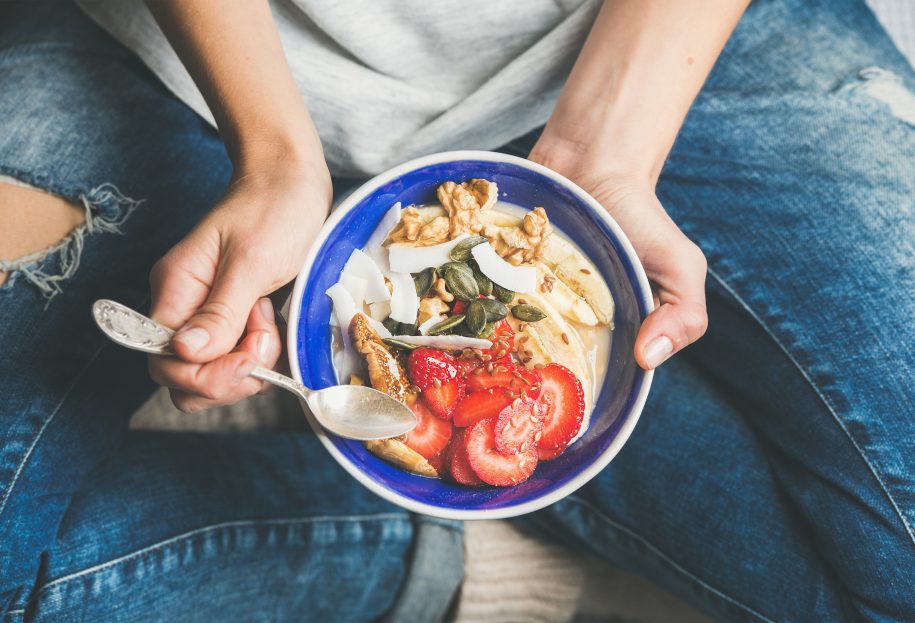 Person eating oatmeal
