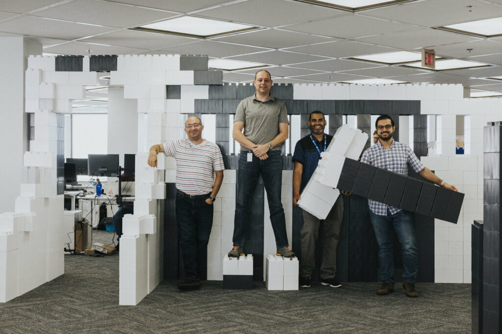 ApplyBoard Staff in Office with Giant Lego Blocks