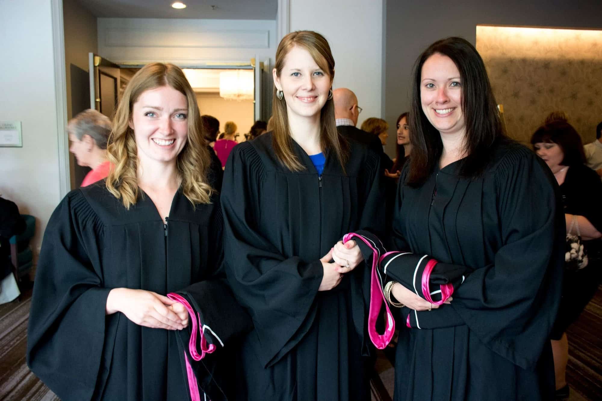 Photo of three Yorkville University graduates