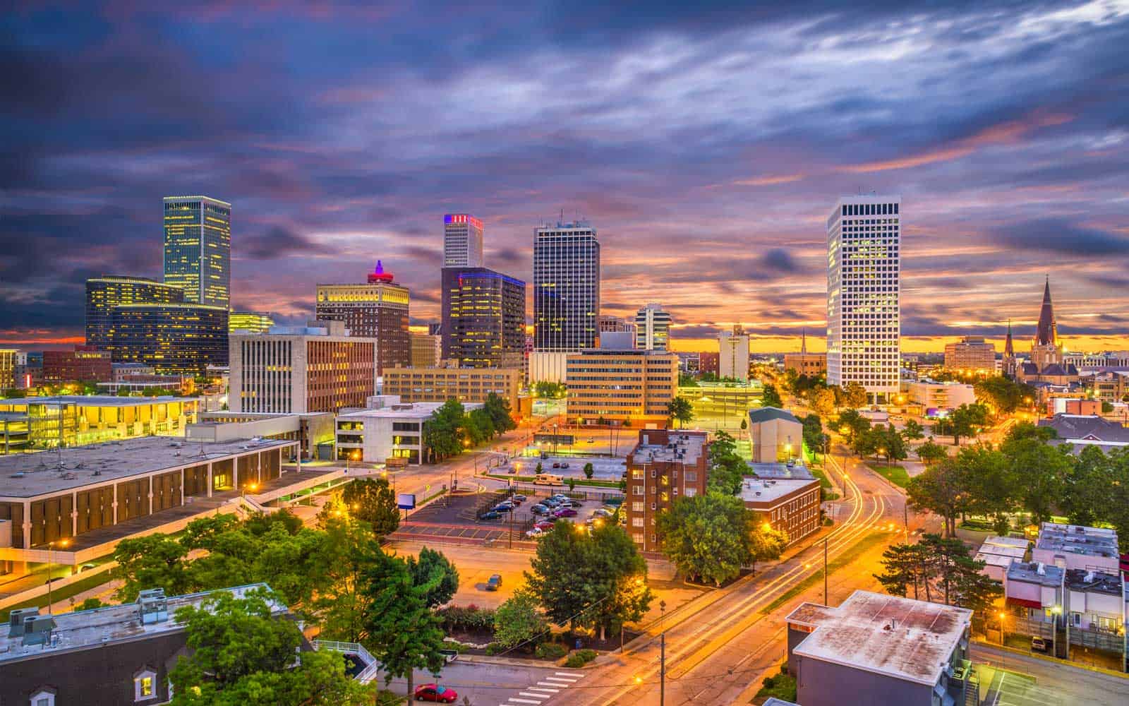 A photo of Tulsa Oklahoma during a sunset.
