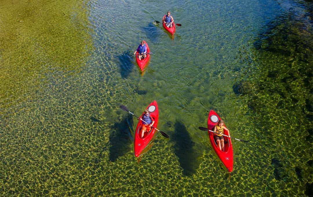 A photo of kayakers at the Saco River.