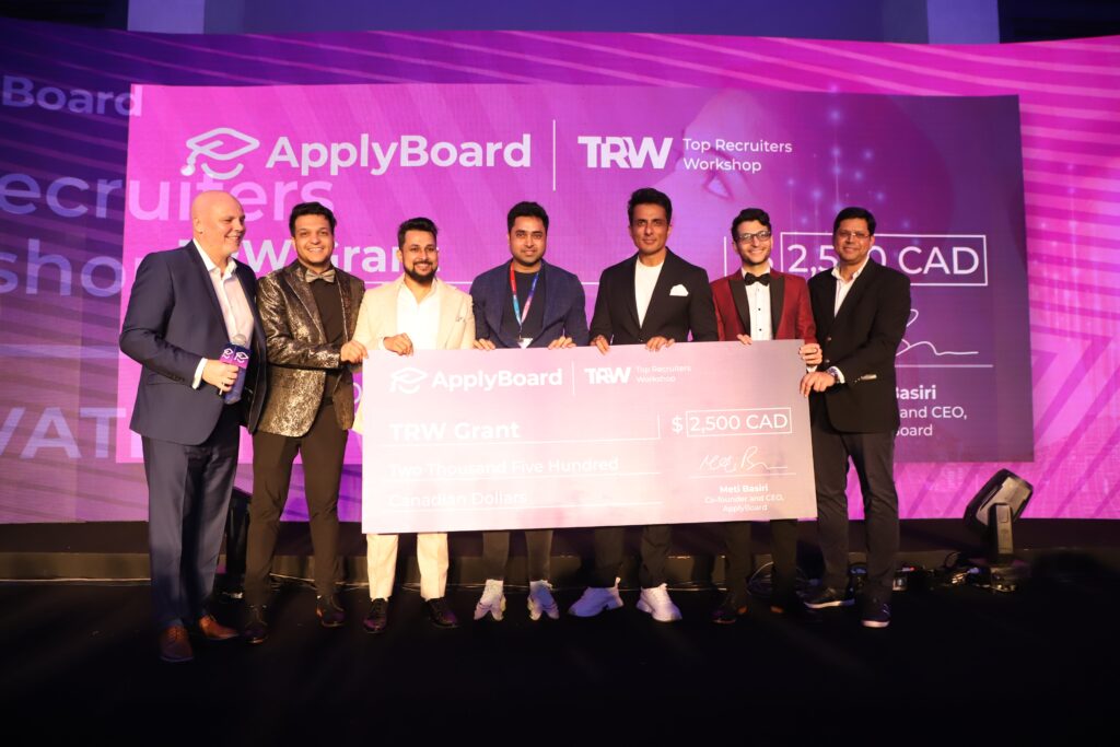 Actor and philanthropist Sonu Sood with several key members of the ApplyBoard leadership team, awarding a C$2,500 TRW student grant.  