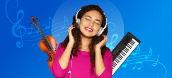 Woman student listening to headphones and surrounded by instruments