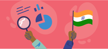 Hands holding magnifying glass and India flag