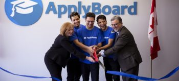 ApplyBoard's CMO, CEO, and COO cutting a blue ribbon with Ward 10 Councillor for Kitchener Sarah Marsh and University of Waterloo President Feridun Hamdullahpur.