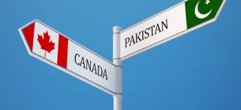 Sign showing direction of Canada and Pakistan